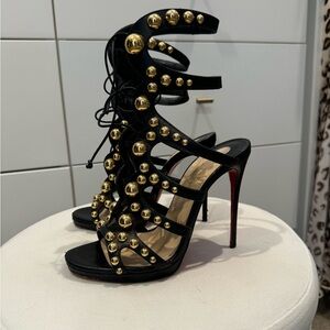 Christian Louboutin Black and Gold Stiletto Heels